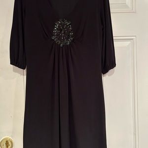 Elle just about at knee dress with detailing